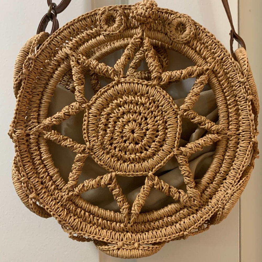 Tan crochet cross body bag.